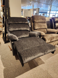 The La-z-boy 519 Astor Rocker Recliner features an oversized gray design and extended footrest for showroom appeal.