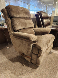 The La-z-boy 519 Astor Rocker Recliner features brown upholstery, a wooden lever, and an adjustable backrest.