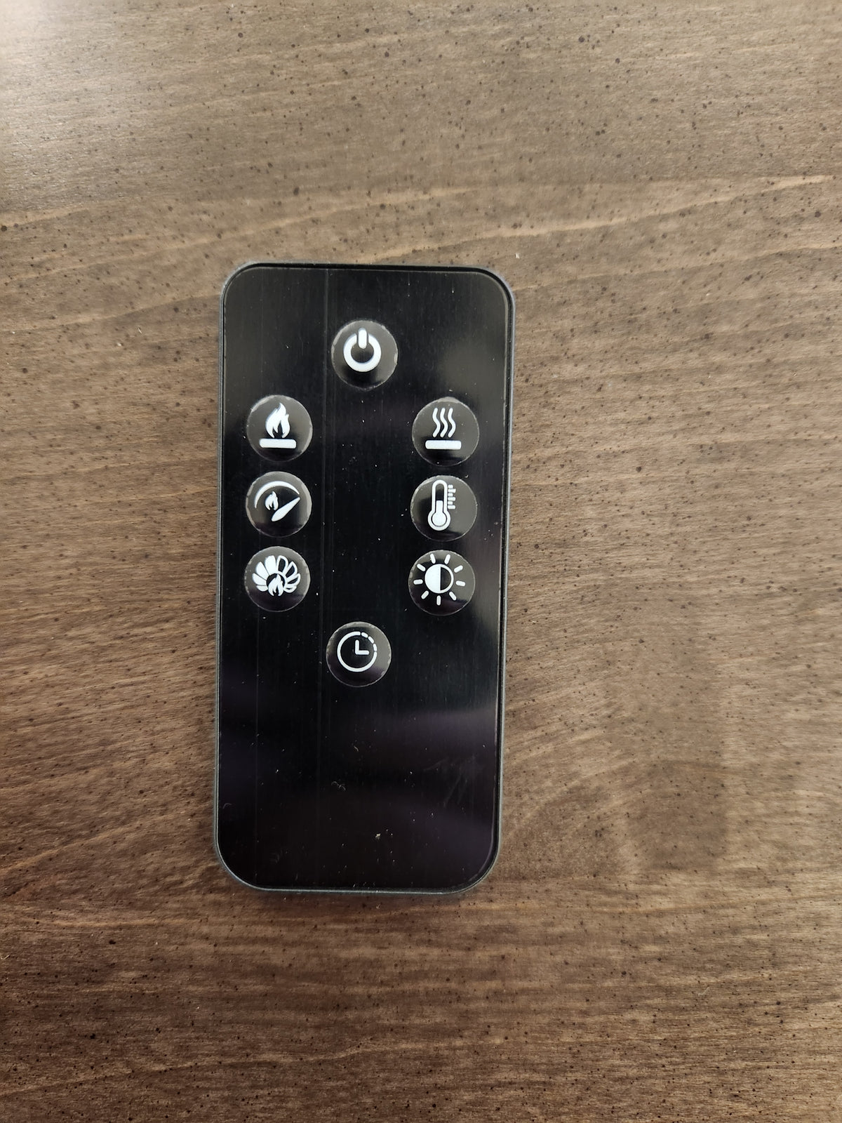 Durham 905-Open Corner Cabinet remote: 8 buttons control power, heat, flame, fan, timer, light & logs.