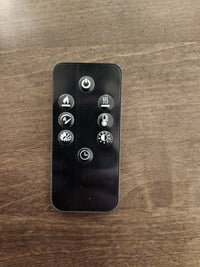 Durham 905-Open Corner Cabinet remote: 8 buttons control power, heat, flame, fan, timer, light & logs.