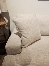 La-z-boy 663 Paxton Sofa with ComfortCore® cushions and a square cushion, next to a round table with a wicker lamp.