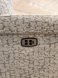 Close-up of Best’s 3LZ40E Prima High-Leg Recliner with textured beige fabric, four control buttons, and USB port.