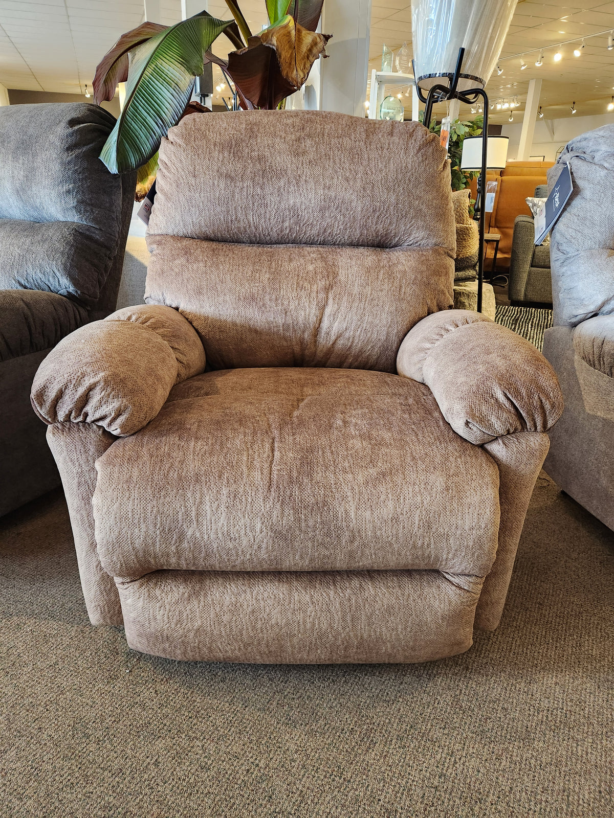 The Best 7MP84 Ellisport Power Space Saver Recliner is showcased with other space-saving recliners in the showroom.