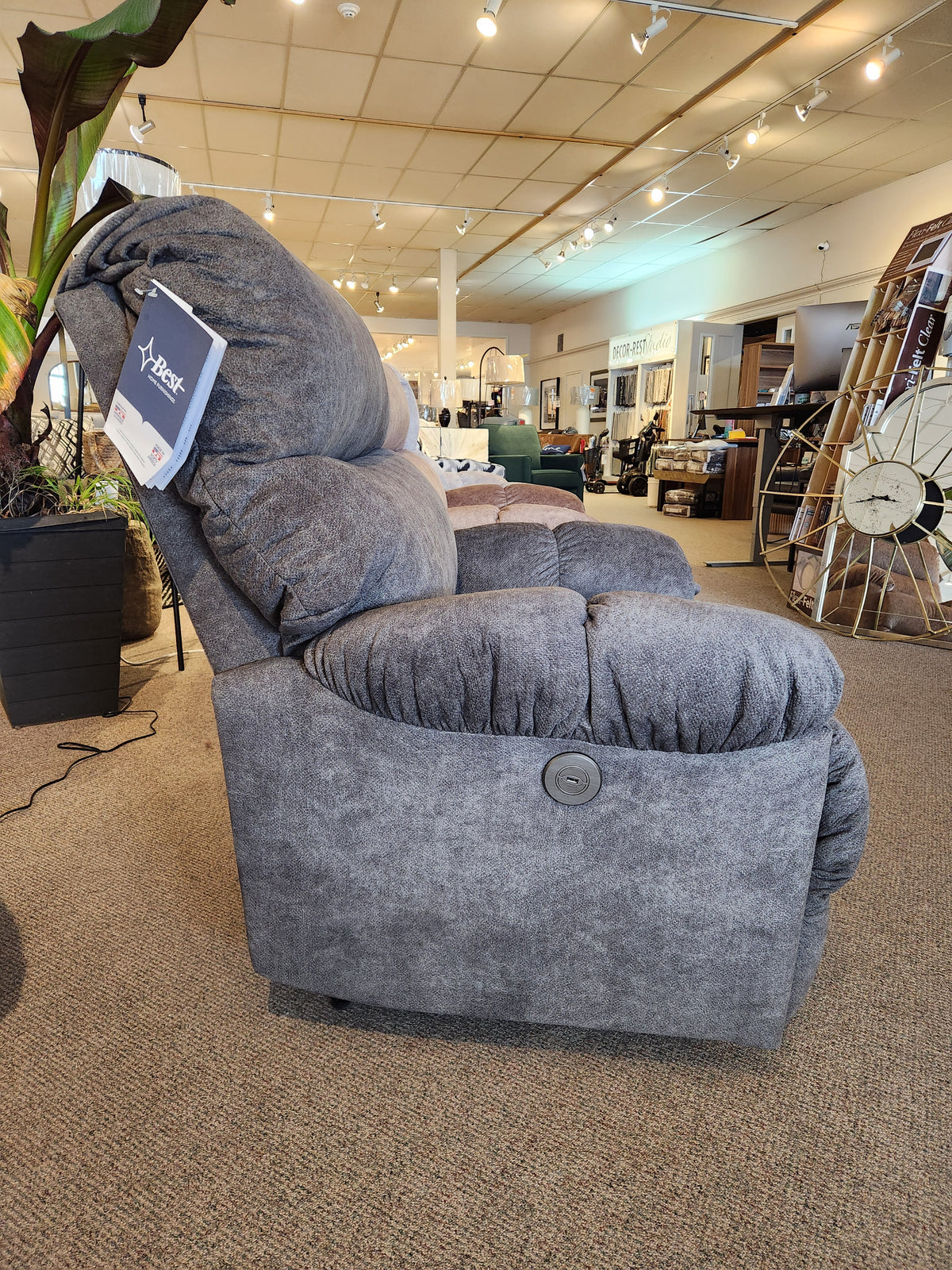 Side view of the Best 7MP84 Ellisport Power Space Saver Recliner in gray, with push-button control on the armrest.