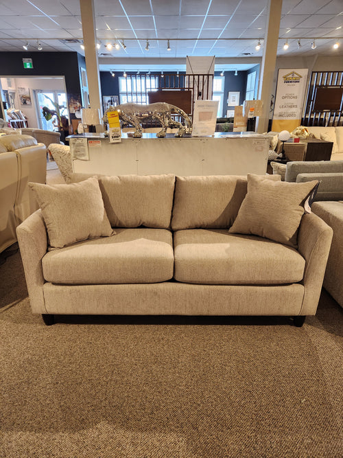 The Best Bayment Double Sofa Bed features beige upholstery, two cushions, and back pillows for stylish, comfortable sleep.