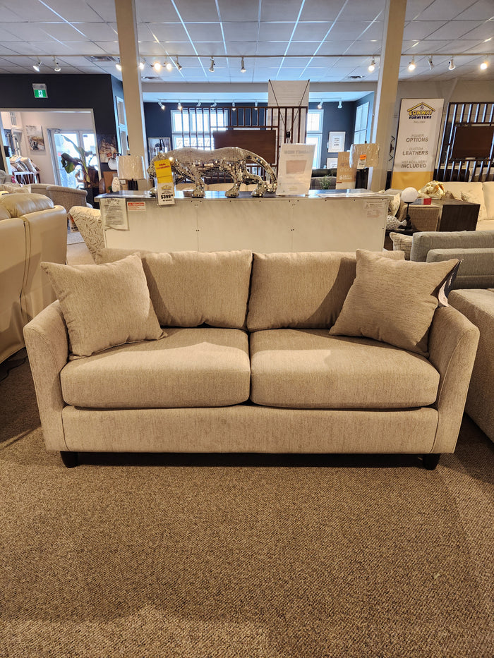 The Best Bayment Double Sofa Bed features beige upholstery, two cushions, and back pillows for stylish, comfortable sleep.