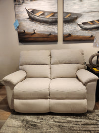 The La-z-boy 727 Brooks Reclining Loveseat offers custom comfort and looks stylish indoors by boat-themed artwork.
