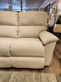 The La-z-boy 727 Brooks Reclining Sofa in beige features padded armrests and seat cushions for personalized comfort.