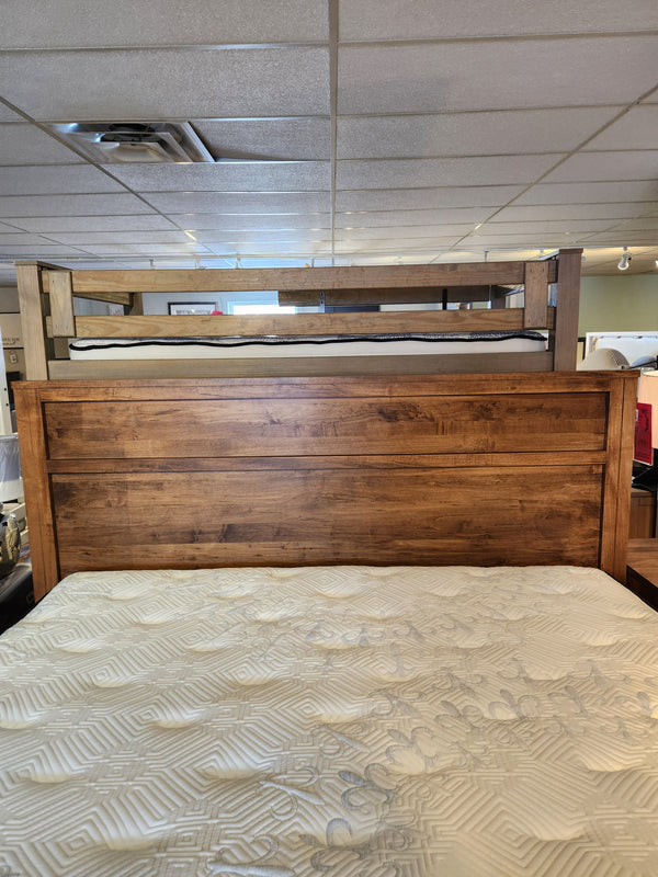 247 Vokes Saugeen King Bed Frame by Vokes displayed in showroom, with a bunk bed visible in the background.