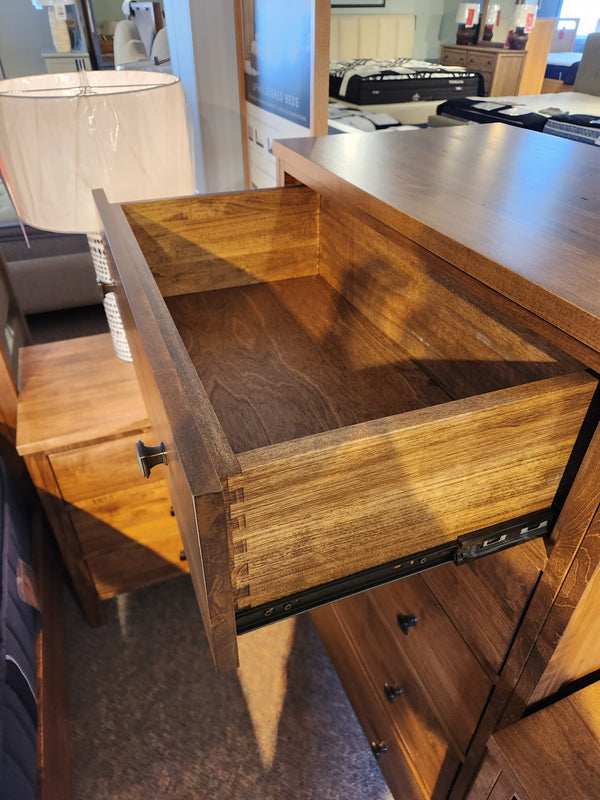 The Vokes 247 Vokes Saugeen 5 Drawer Chest features dovetail joints and metal slides for smooth drawer operation.