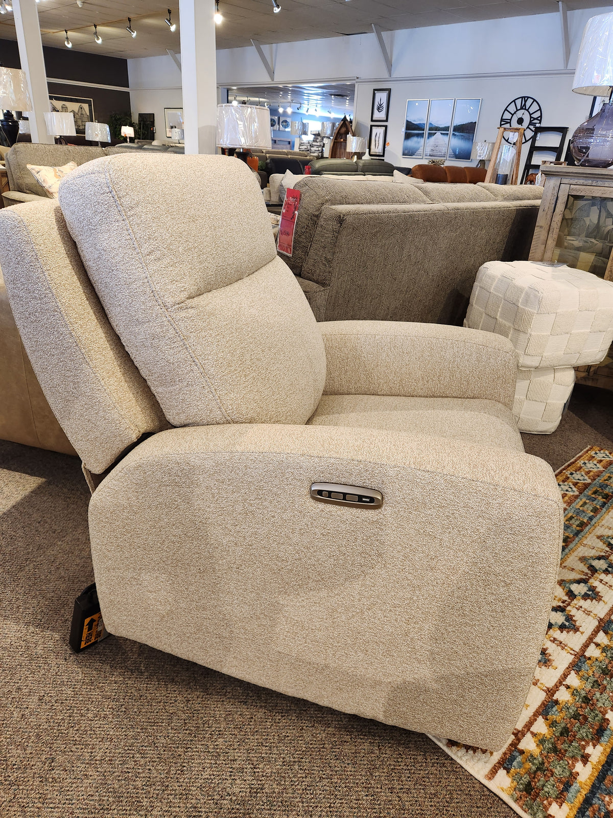 Aurora Furniture's 88365 Muskoka Power Reclining Chair with Zero Gravity, shown in a modern rustic showroom.