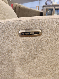 Close-up of a beige Aurora Furniture 88365 Muskoka Power Reclining Chair armrest with control buttons and USB port.
