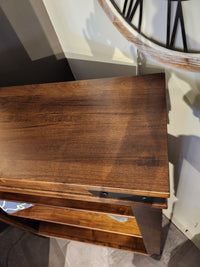 The Handstone CH75 Chattanooga 54" Bookcase features a maple mocha finish and sturdy metal brackets—perfectly adjustable.