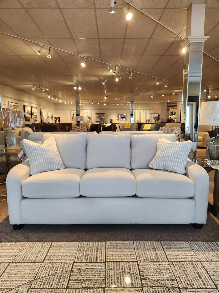The La-z-boy 638-610 Charlie Sofa features four seat cushions and detached back pillows, on display in our showroom.