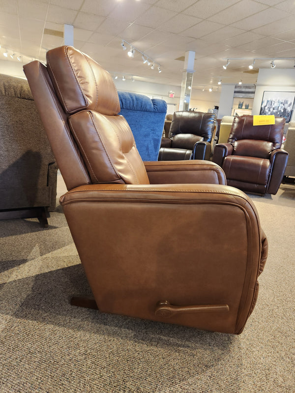 Side view of La-Z-Boy 807 Baron Rocker Recliner, brown leather, high back, lumbar support & lever near base.