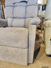 Light gray Golden Aurora PL480 Power Lift Chair with textured fabric, shown indoors on a carpeted floor.
