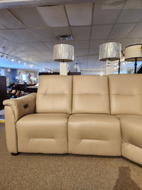 Palliser Oxford 3-piece sectional with power recline and adjustable headrest on display in the showroom.