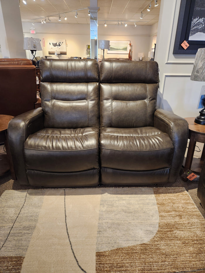 The La-Z-Boy 807 Baron Reclining Loveseat in brown leather with lumbar support is shown on a patterned rug.