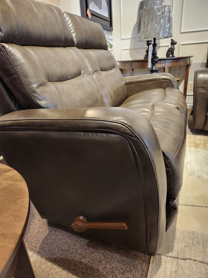 La-Z-Boy 807 Baron Reclining Loveseat with lumbar support and wooden lever in a living room setting.