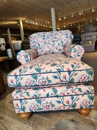 The Kress Chaise Lounge by Best brings heirloom charm and floral style to any room with wooden floors. Matching ottoman included.