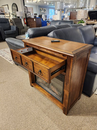 Jofran 1900 Bakersfield 32" Fireplace with three open drawers and remote, ideal for saving space in any room.