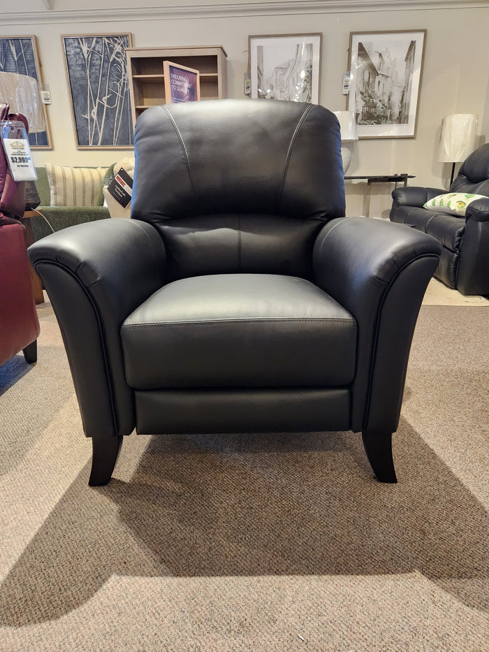 Leather Craft 698 Reclining Chair: Black leather armchair with curved armrests, shown on a carpeted showroom floor.