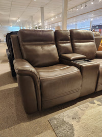 Donald Choi San Antonio Power Recliner Loveseat-520356 with cup holders and adjustable headrest in a bright showroom.