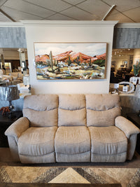 La-z-boy 521 James Sofa, beige, three seats, showroom display with desert painting and lamps on side tables.