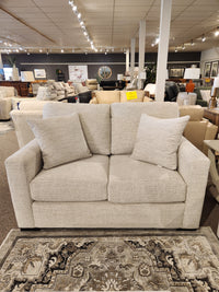 The Superstyle 9540 Stationary Loveseat features a cushioned back—ideal for modern spaces and pairs well with sofas.