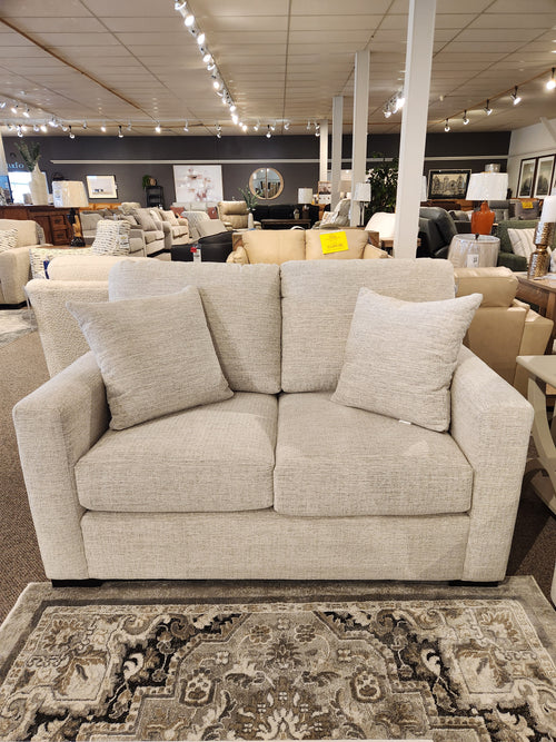 The Superstyle 9540 Stationary Loveseat features a cushioned back—ideal for modern spaces and pairs well with sofas.