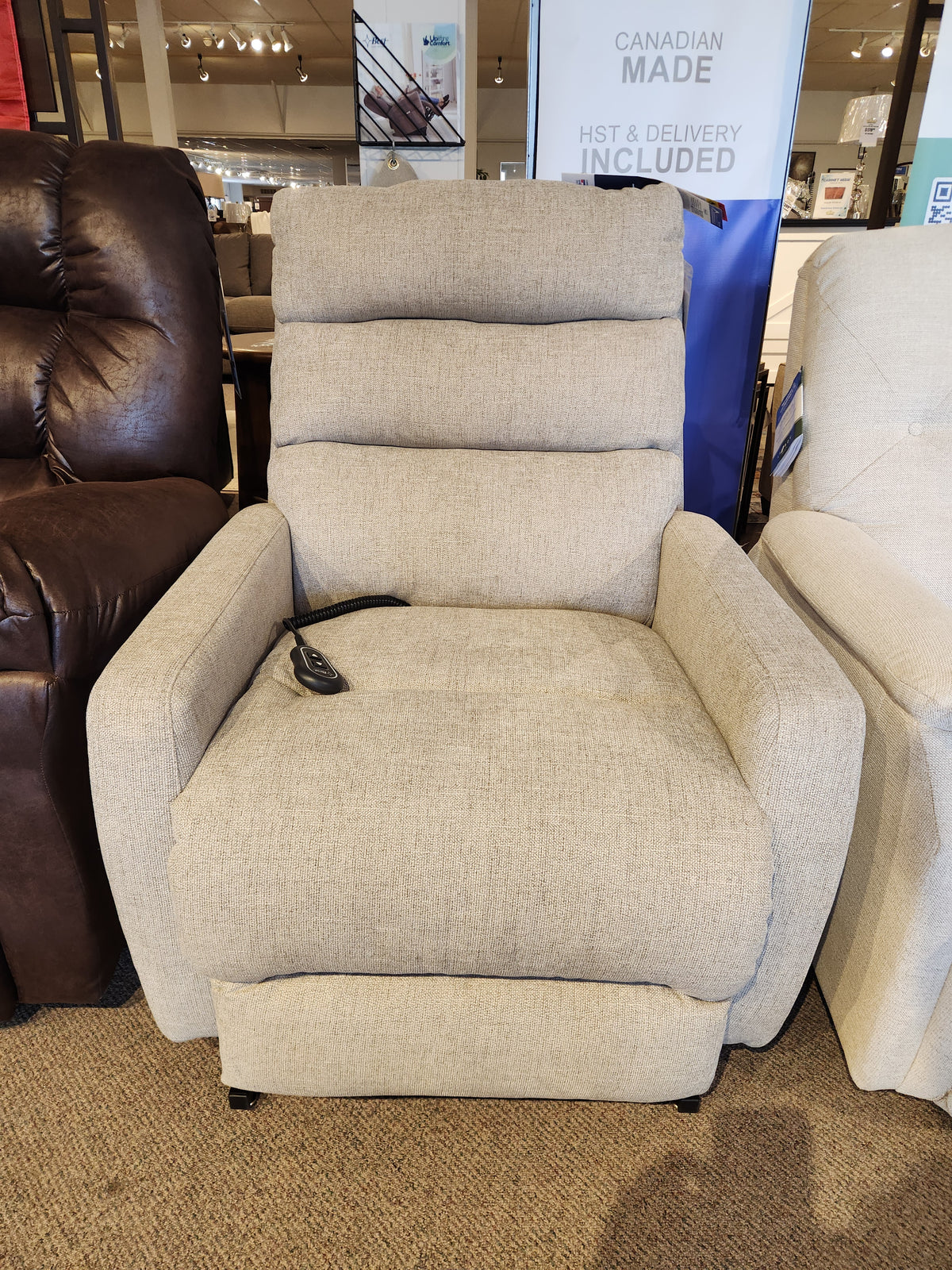 Best 9N31 Kristisha power lift chair with remote and lumbar adjustment, shown in a furniture showroom.
