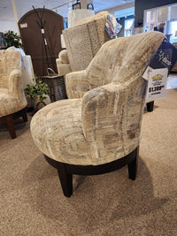 Best Ronan 2908 Swivel Chair with wood swivel base, displayed in-store, priced at $1,399.