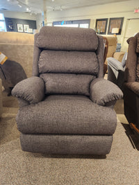 La-z-boy 519 Astor Rocker Recliner with adjustable back cushions displayed among other chairs in a showroom.