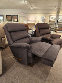 The La-z-boy 519 Astor Rocker Recliner features an extended footrest, offering comfort and support for taller users.