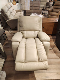 La-z-boy 530 Greyson Power Rocking Recliner with headrest and lumbar, shown extended on wood floors among other chairs.