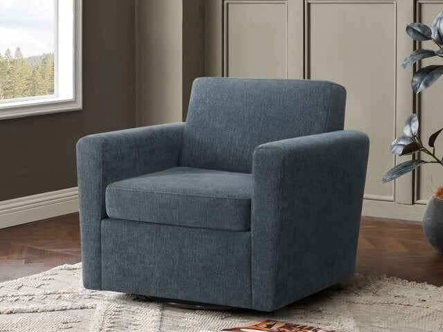 A Donald Choi B65117 Seth Swivel Chair sits on a textured rug in a living room with neutral walls and a large window.