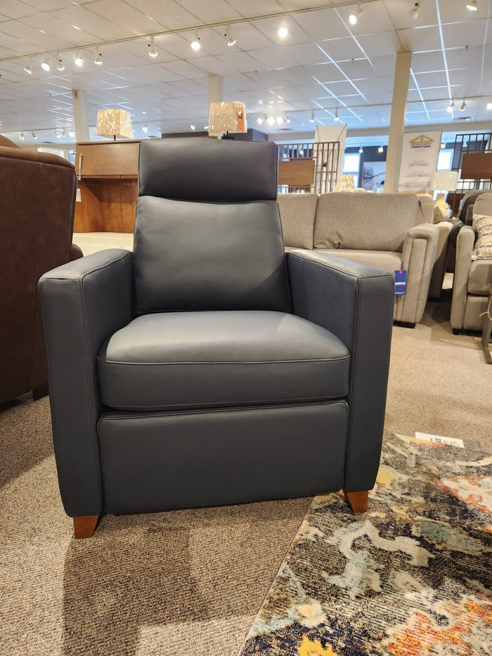 Palliser 77171 Soren Push-Back Reclining Chair in dark gray leather with tapered wood legs, shown in showroom.