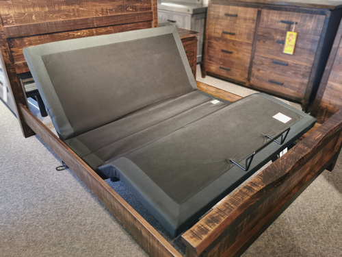 Oasis Adjustable Base by Fashion on display: wooden frame with memory positions and inclined mattress.