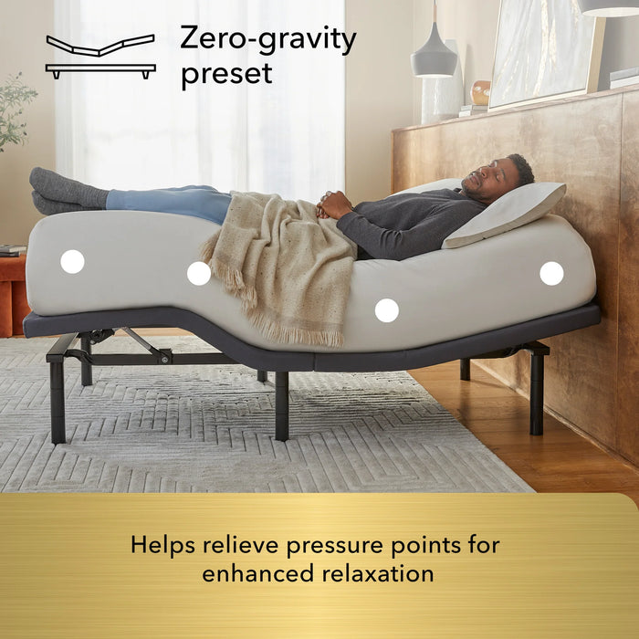 A man relaxes on the Beauty-Rest Gold Adjustable Base in zero-gravity mode, highlighting pressure relief points.