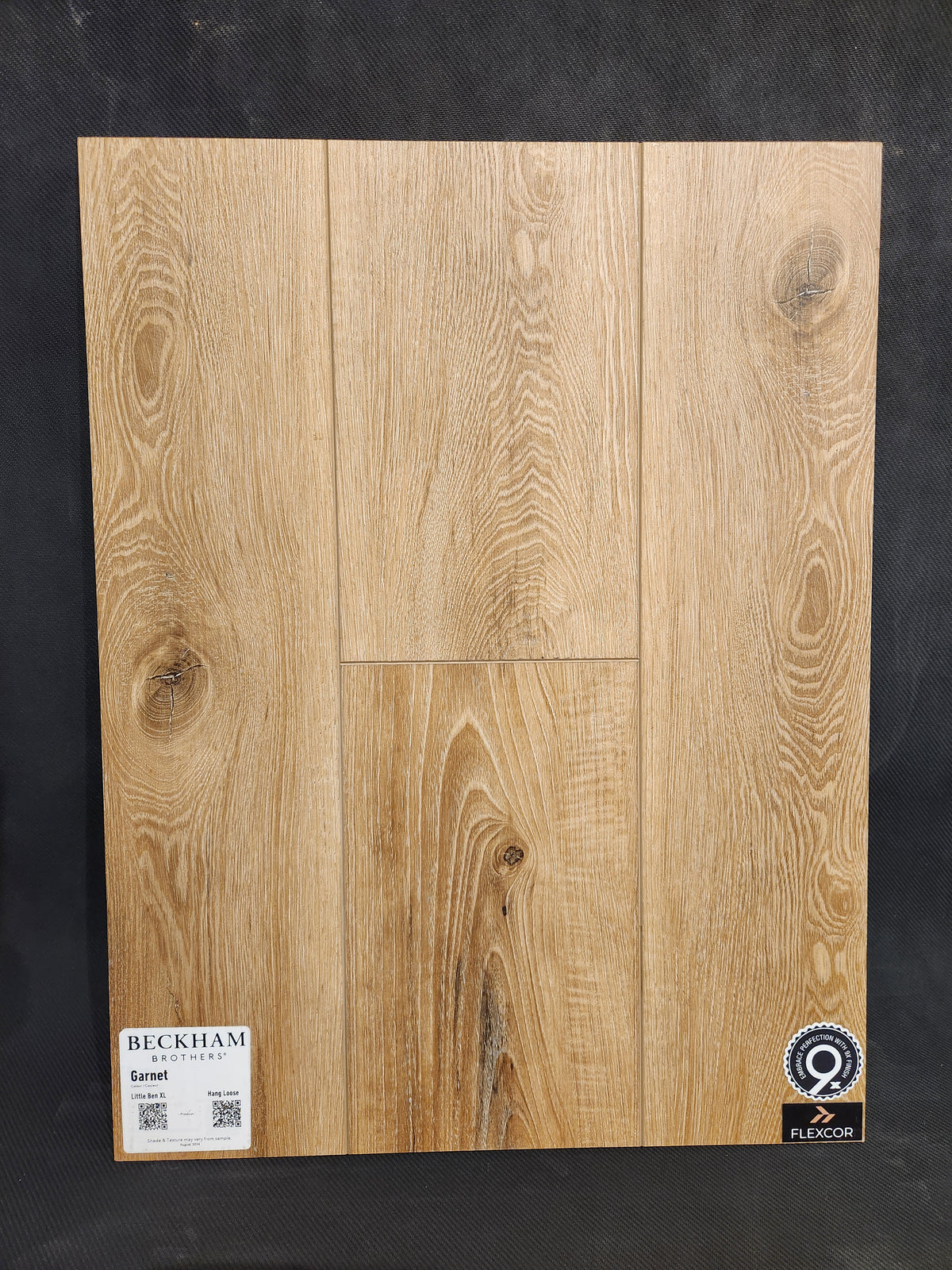 A "Little Ben XL Luxury Vinyl (Click Plank)" sample by Beckham Brothers, highlighting a durable flooring solution.