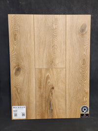 A "Little Ben XL Luxury Vinyl (Click Plank)" sample by Beckham Brothers, highlighting a durable flooring solution.