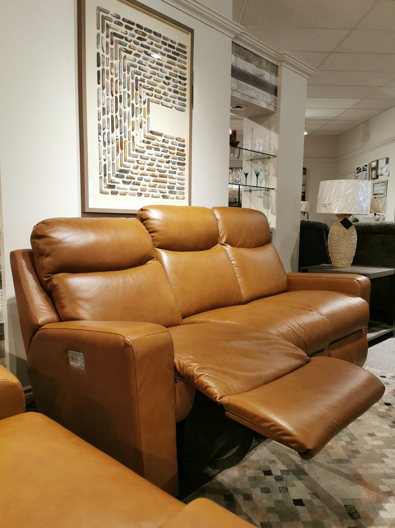 La-z-boy 781 Emmons Reclining Sofa with Headrest in a living room with wall art, rug, and decorative items.