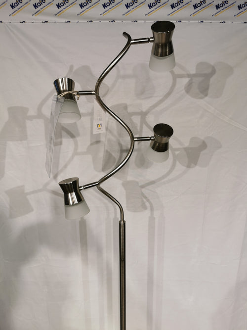 The Adesso Lamp Cyrus Floor Lamp has 3 metal arms, frosted glass shades, and an LED touch smart switch for custom lighting.