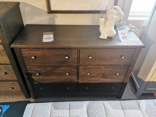 Vaughan Bassett's 10-002 Fundamentals Dresser: a six-drawer beauty with two price tags and a quirky monkey hourglass on top.