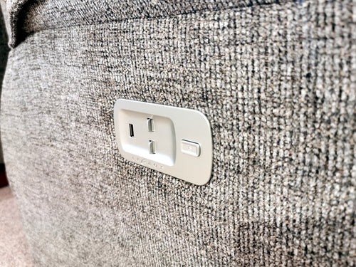 Close-up of La-z-boy 706 Jay Power Sofa with Headrest's outlet and USB port, blending style and function.