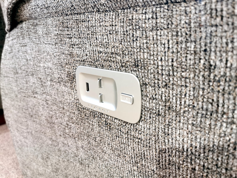 Close-up of La-z-boy 706 Jay Power Sofa with Headrest's outlet and USB port, blending style and function.