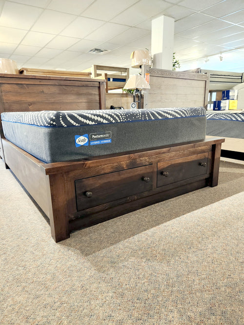 The Munros Tongue & Groove Queen Bed features solid wood, two storage drawers, and includes a mattress.
