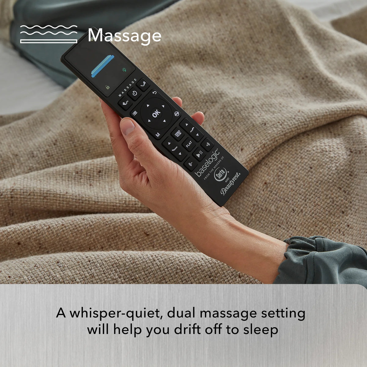 A hand holds a remote over a beige blanket, highlighting Beauty-Rest's Platinum Adjustable Base with whisper-quiet dual massage.