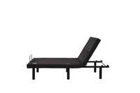 The Fashion Tranquility Adjustable Base in black is shown in profile with a raised head section against a white background.
