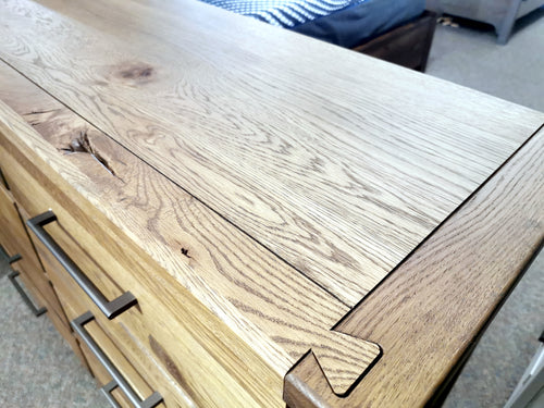 The 752 Dovetail 8-Drawer Dresser by Vaughan Bassett is crafted from White Oak, featuring English dovetails and metal handles.